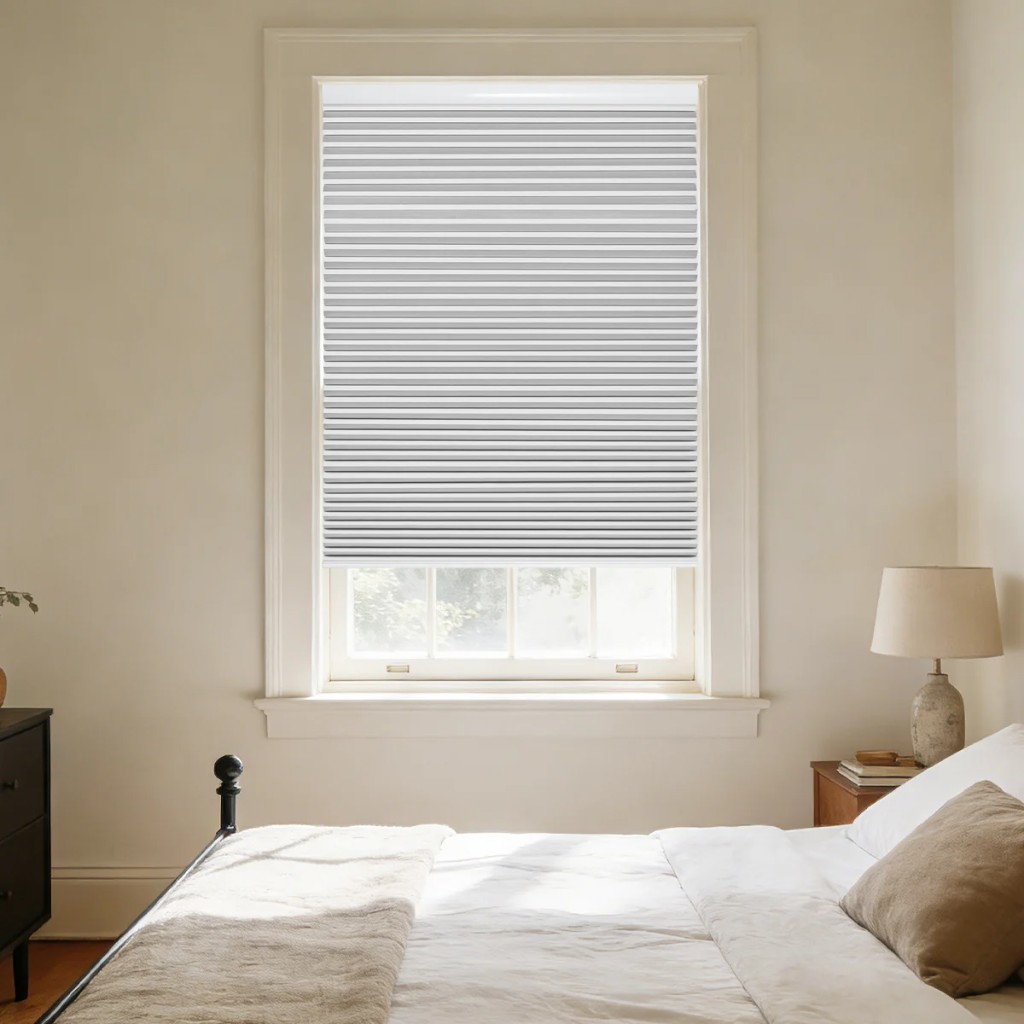 Persilux pleated cellular shades in a bright modern bedroom